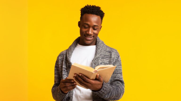 Man reading a book; purpose-driven leadership books