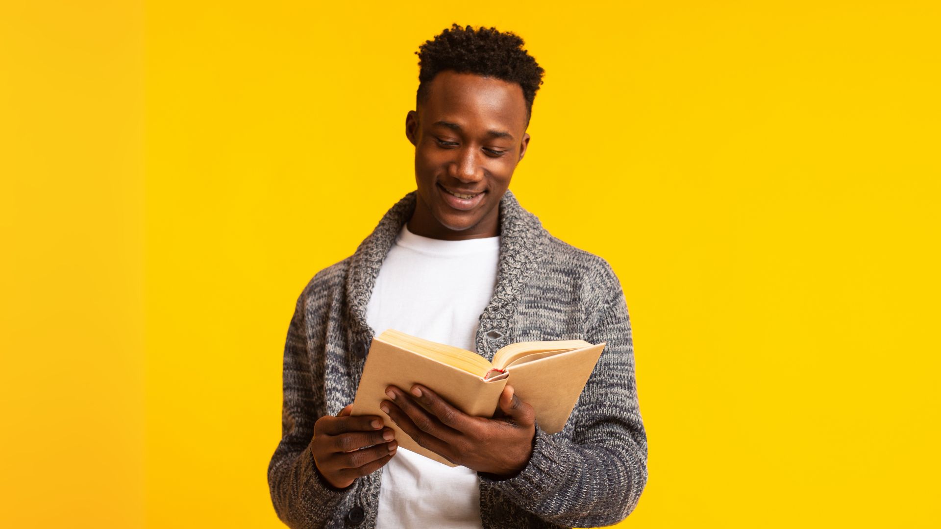 Man reading a book; purpose-driven leadership books